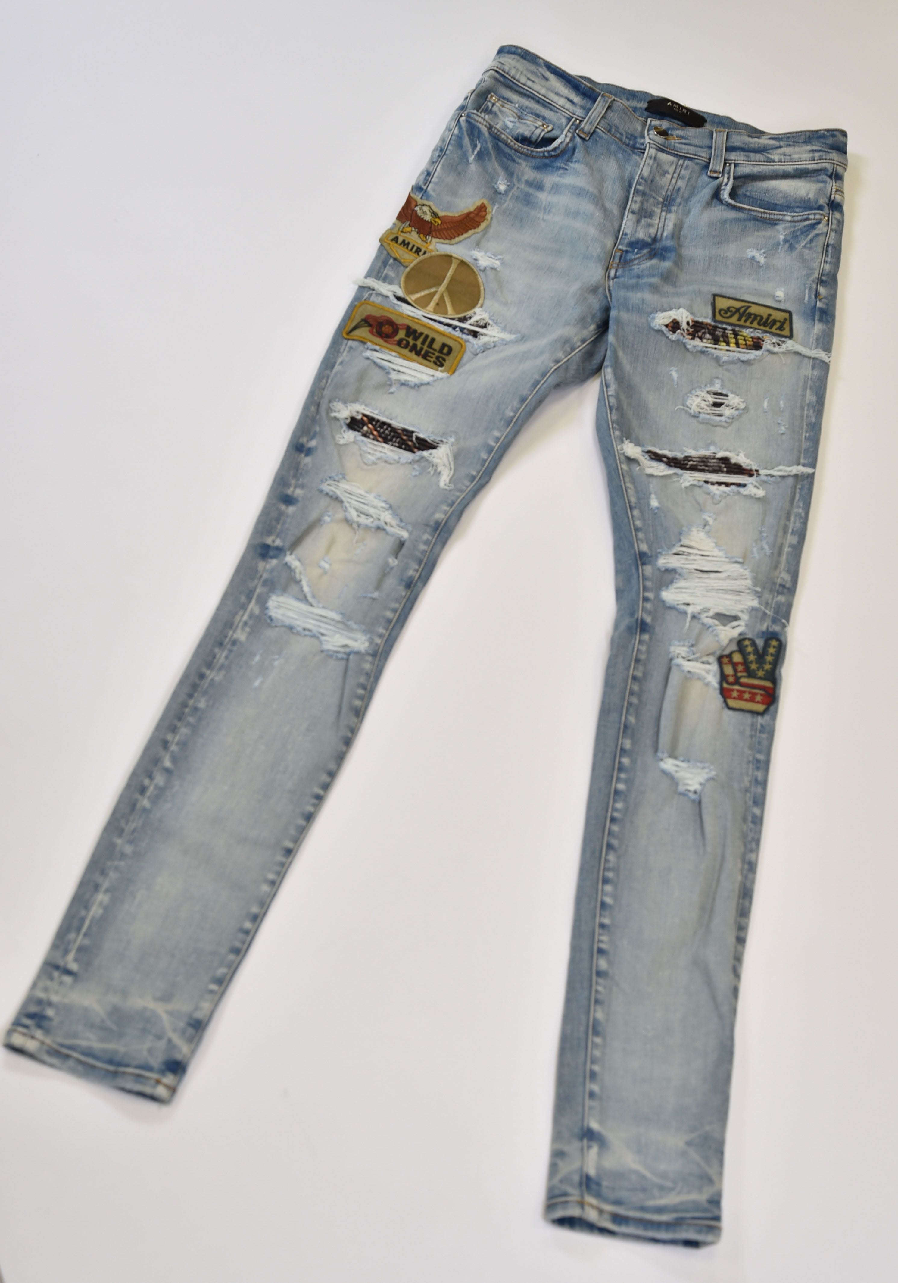 Amiri MX1-Style Distressed Skinny Jeans with Patchwork Appliqué (Eagle / Peace / Wild Ones) - Image 3