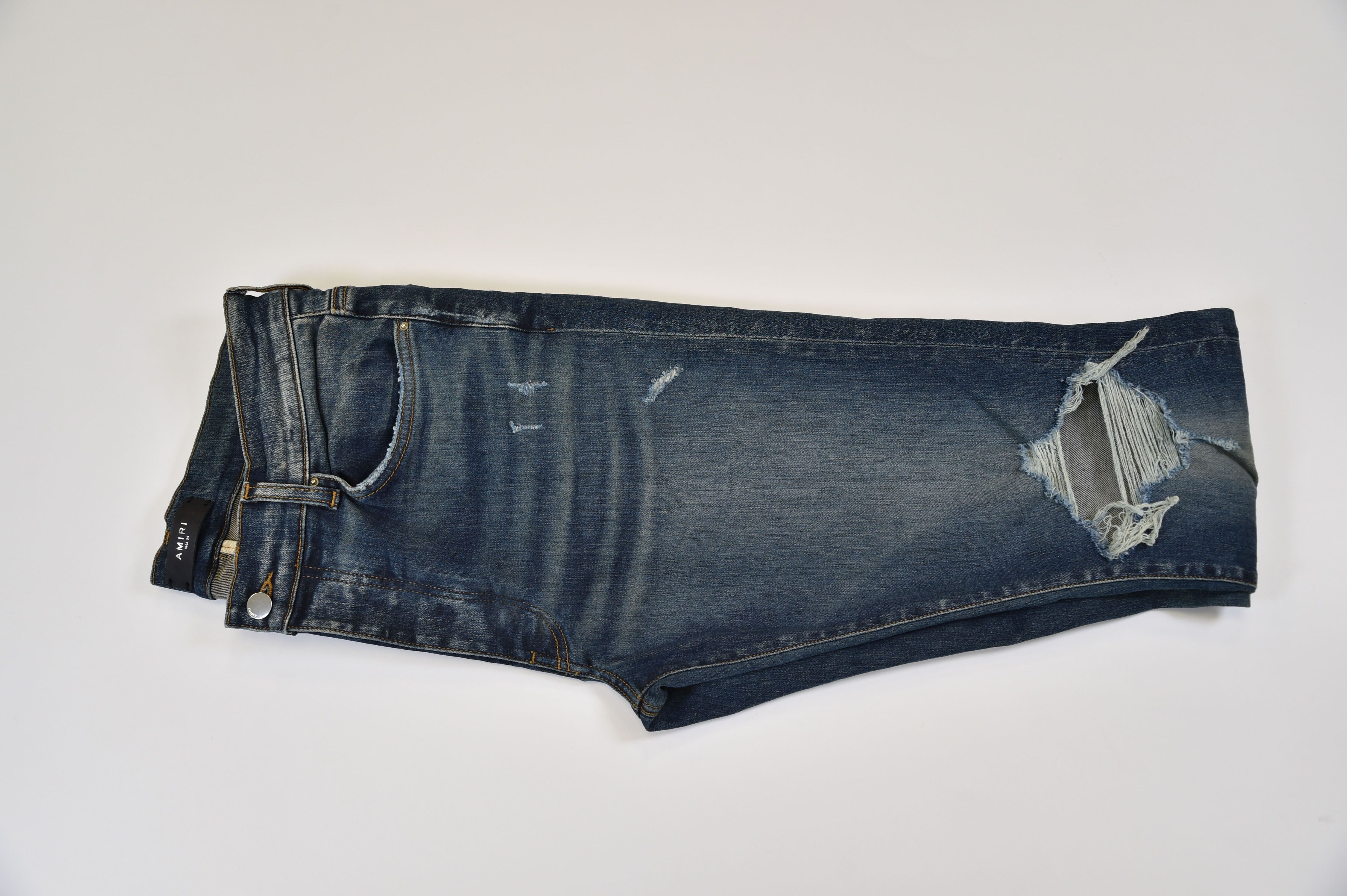 Amiri MX1 Skinny Distressed Jeans - Image 1