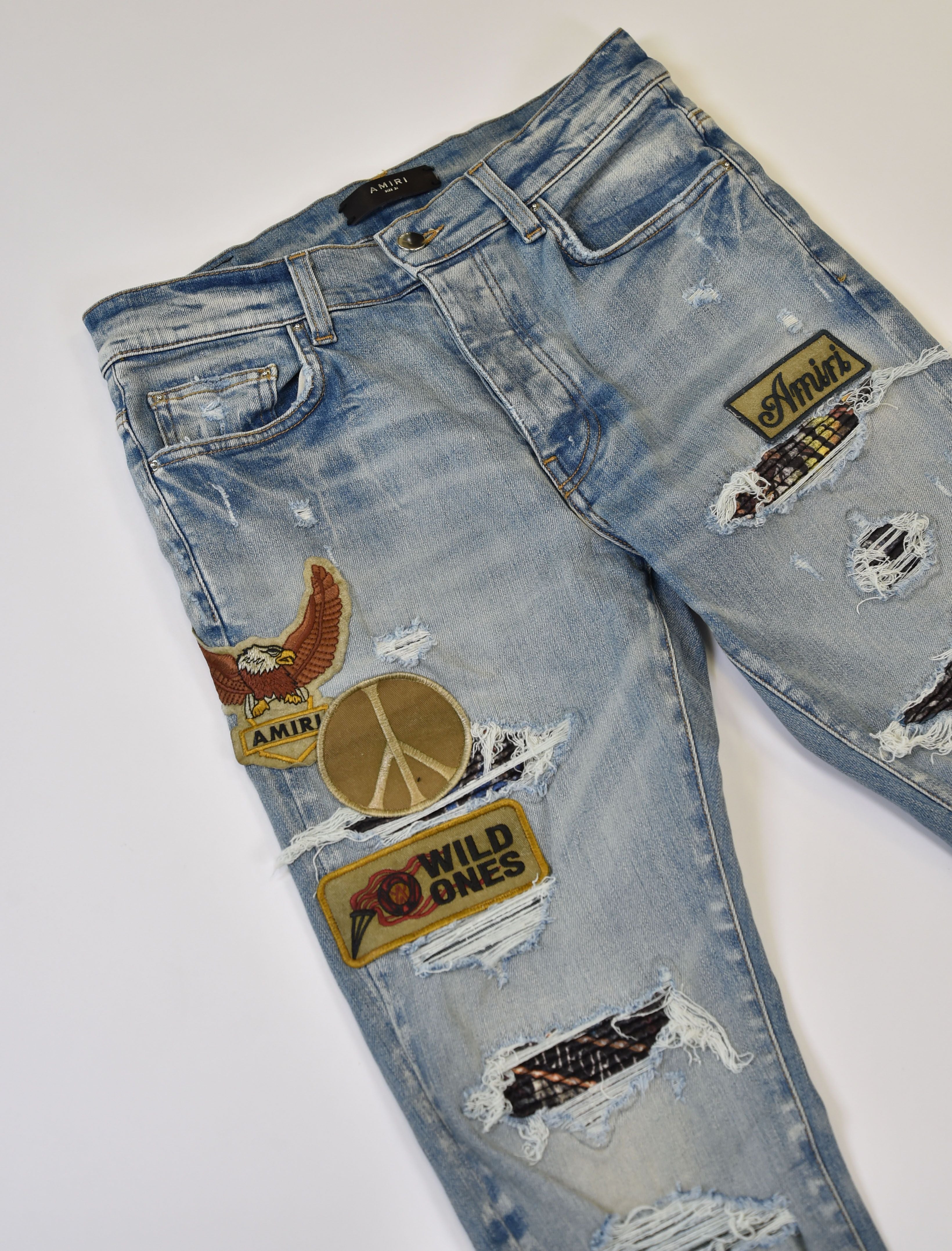 Amiri MX1-Style Distressed Skinny Jeans with Patchwork Appliqué (Eagle / Peace / Wild Ones) - Image 4